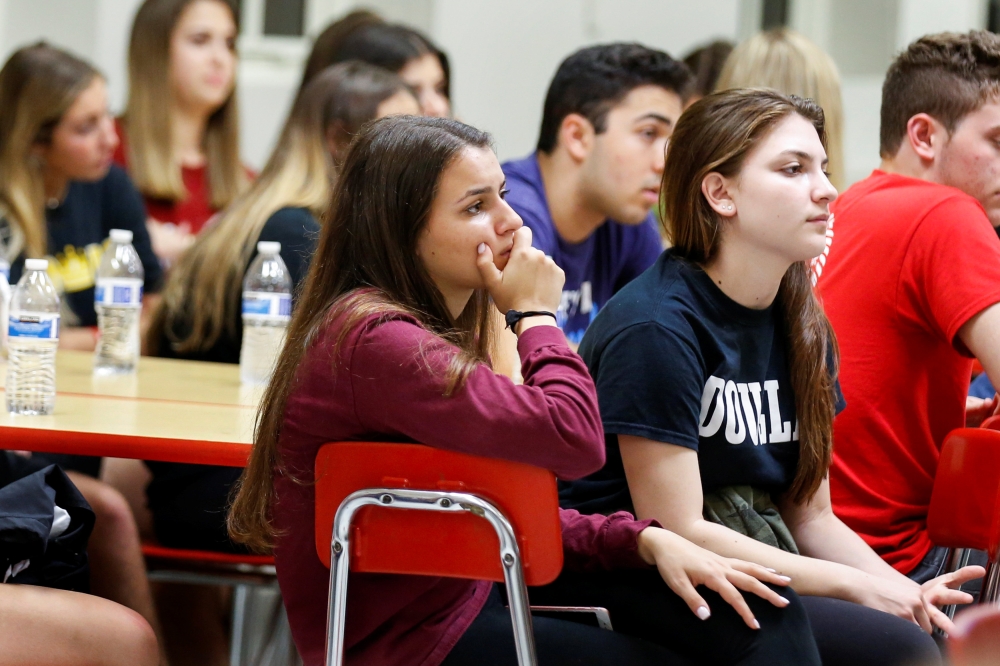 Students from Marjory Stoneman Douglas High School listen to a speaker at Leon High School instruct them on how to speak with Florida state legislators about strengthening gun control laws, following last week's mass shooting on their campus, in Tallahass