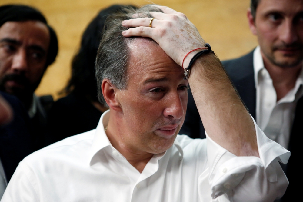 Mexico's ruling Institutional Revolutionary Party (PRI) presidential candidate Jose Antonio Meade attends a meeting with foreign media in Mexico City, Mexico February 21, 2018. REUTERS/Ginnette Riquelme