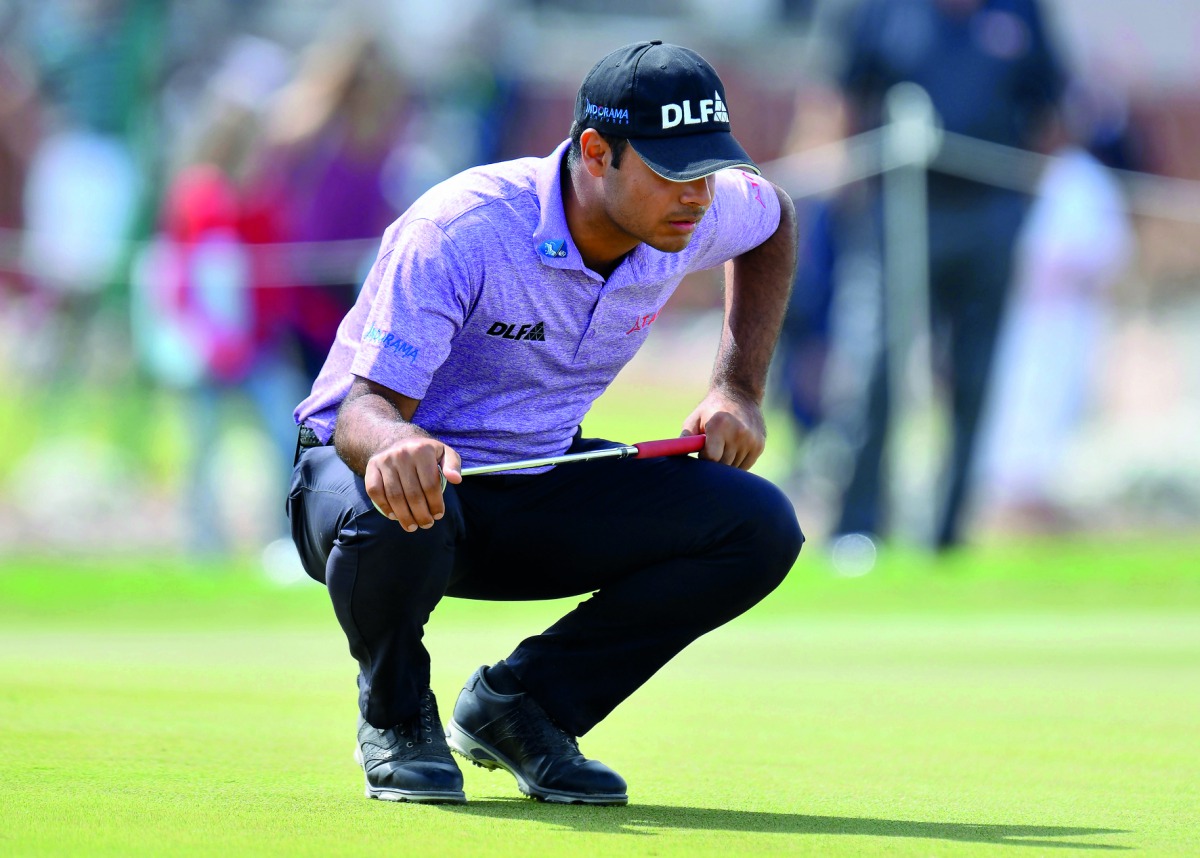Shubhankar Sharma of India plans his next move on the greens at the Qatar Masters golf tournament at the Doha Golf Club yesterday.