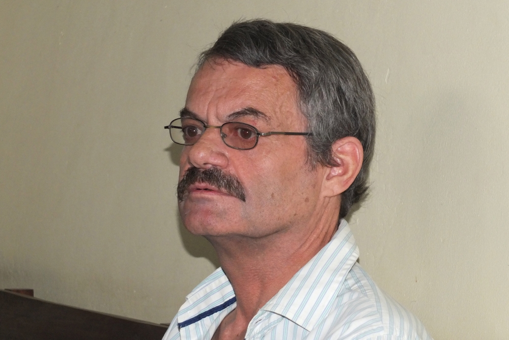 William John Endley, a South African national and an adviser to South Sudanese rebel leader Riek Machar, sits in the dock, in the High Court in Juba, South Sudan February 23, 2018. REUTERS/Samir Bol