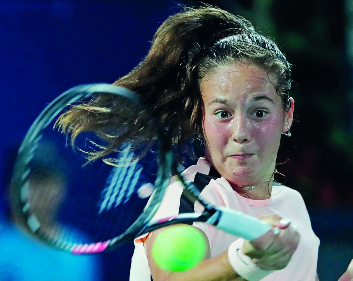 Daria Kasatkina or Russia returns the ball to Garbine Muguruza of Spain during their semi-final match at the WTA Dubai Duty Free Tennis Championship on February 23, 2018. AFP / Karim Sahib