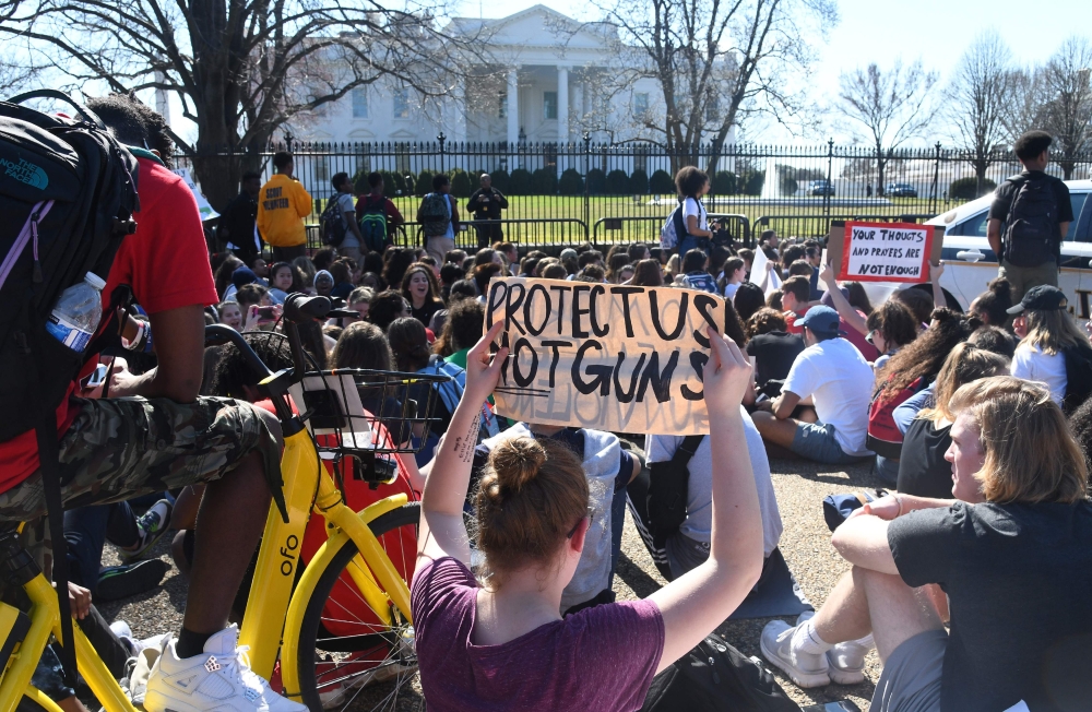 Hundreds of high school and middle school students from the District of Columbia, Maryland and Virginia staged walkouts and gather in front of the White House in support of gun control in the wake of the Florida shooting February 21, 2018 in Washington, D