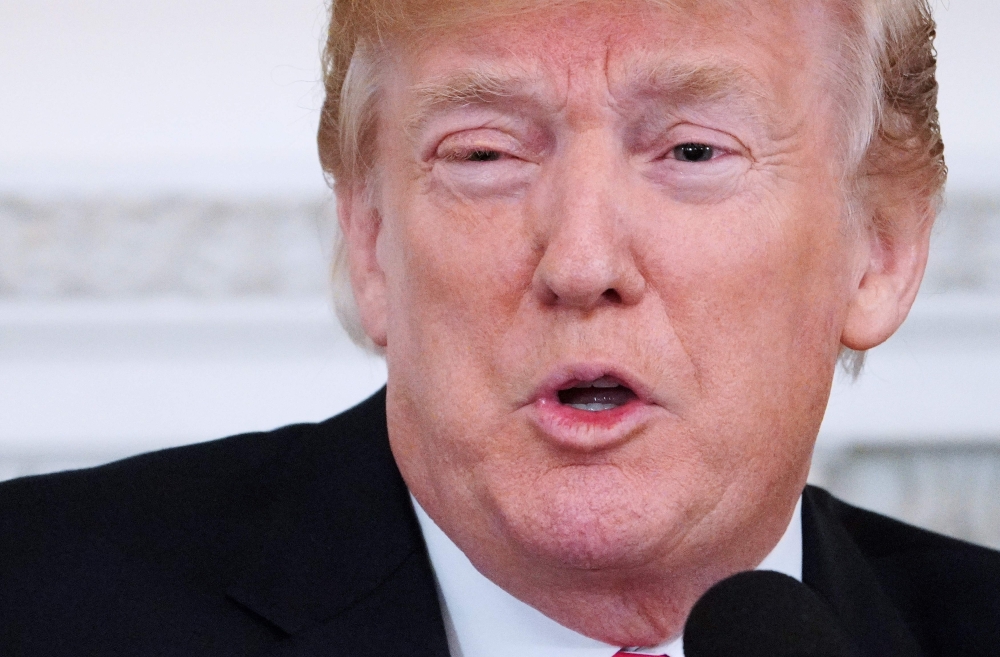 US President Donald Trump speaks during the 2018 White House business session with state governors in the State dining Room of the White House on February 26, 2018 in Washington, DC. / AFP / MANDEL NGAN