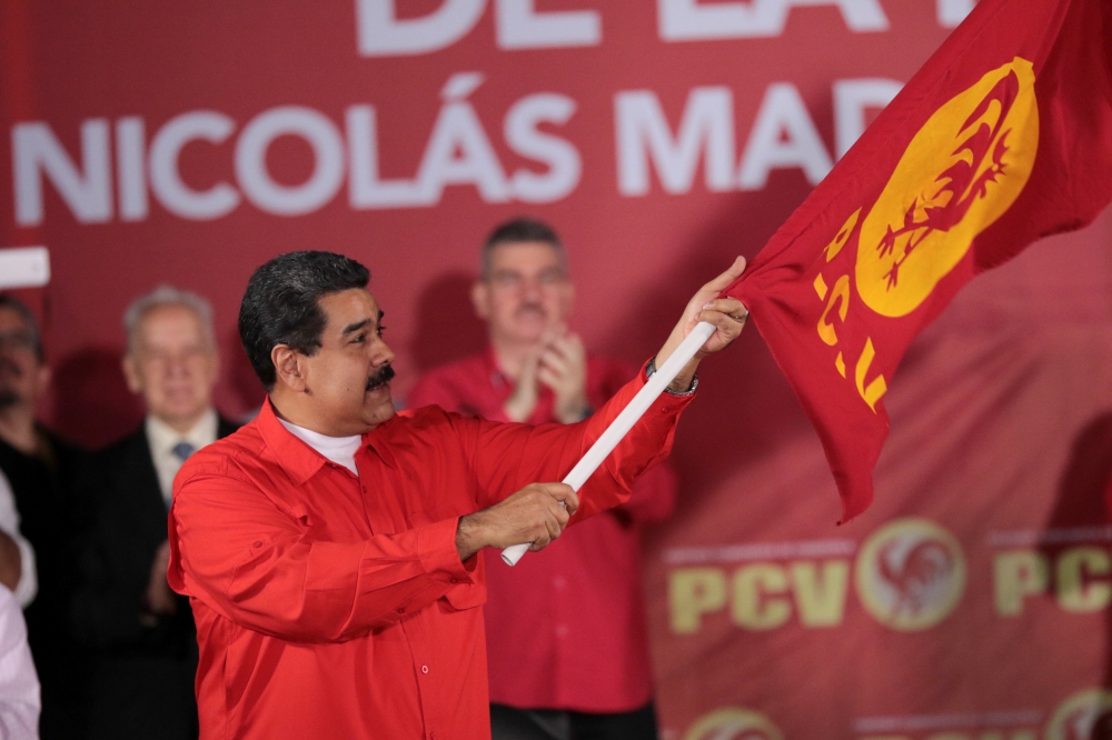 Venezuela's President Nicolas Maduro attends a meeting with the Venezuelan Communist Party (PCV) in Caracas, Venezuela February 26, 2018. Miraflores Palace 
