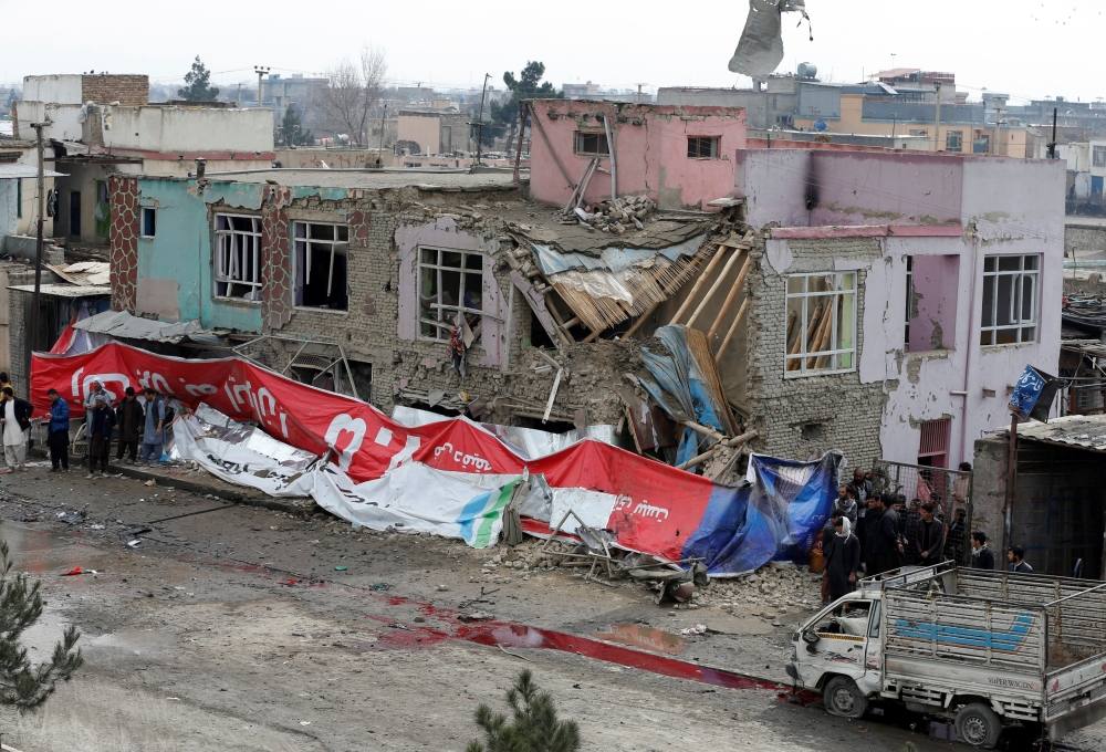 People gather at the site of a suicide bomb attack in Kabul, Afghanistan March 2, 2018. REUTERS/Omar Sobhani