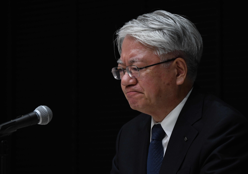Kobe Steel President Hiroya Kawasaki answers questions during a press conference in Tokyo on March 6, 2018. AFP / TORU YAMANAKA