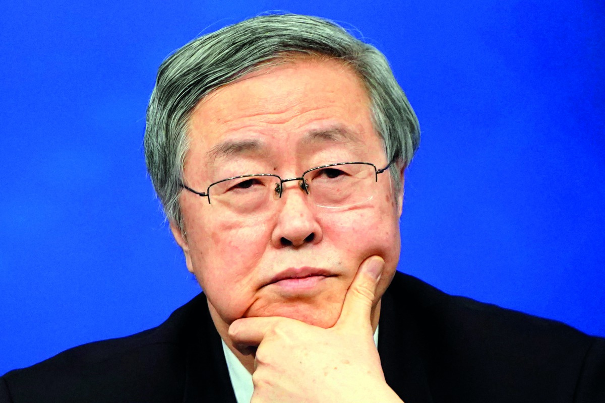 Zhou Xiaochuan, Governor of the People's Bank of China, attends a news conference on the sidelines of China's National People's Congress (NPC) in Beijing, China March 9, 2018. Reuters/Aly Song