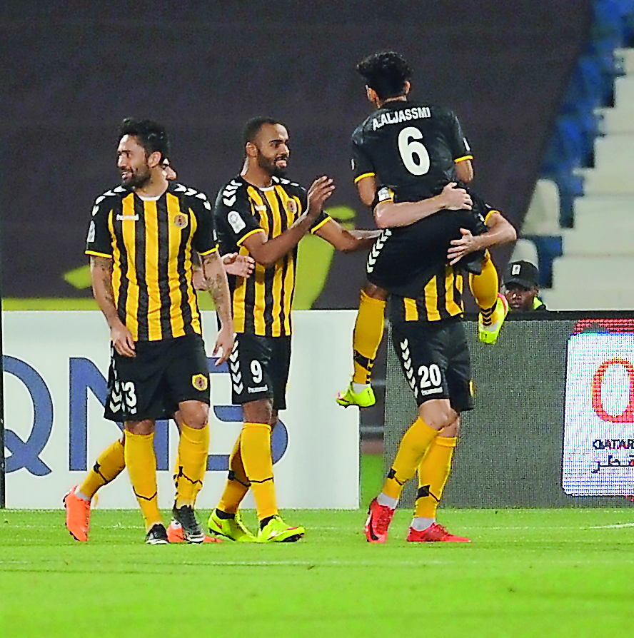 Qatar SC players celebrate their win over Al Khor in Round 20 of the QNB Stars League in Doha yesterday.