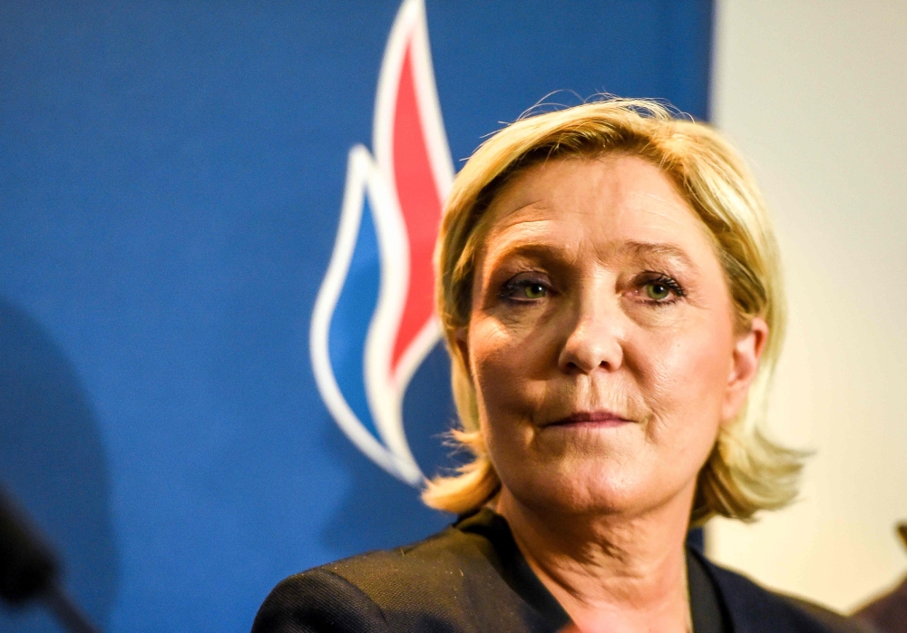 France's far-right party Front National (FN) president Marine Le Pen attends the Front National party annual congress, on March 10, 2018 at the Grand Palais in Lille, northern France. / AFP / PHILIPPE HUGUEN

