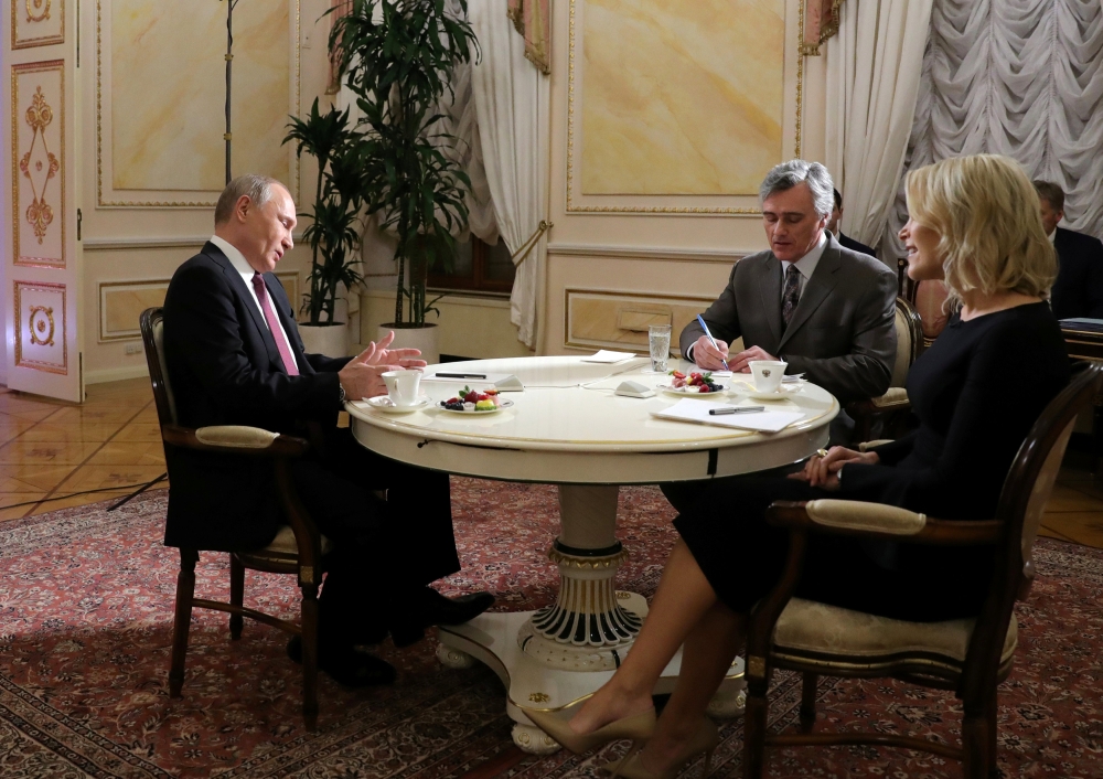 Russian President Vladimir Putin speaks during an interview with NBC's journalist Megyn Kelly at the Kremlin in Moscow, Russia March 1, 2018. Picture taken March 1, 2018. Sputnik/Mikhail Klimentyev/Kremlin via Reuters