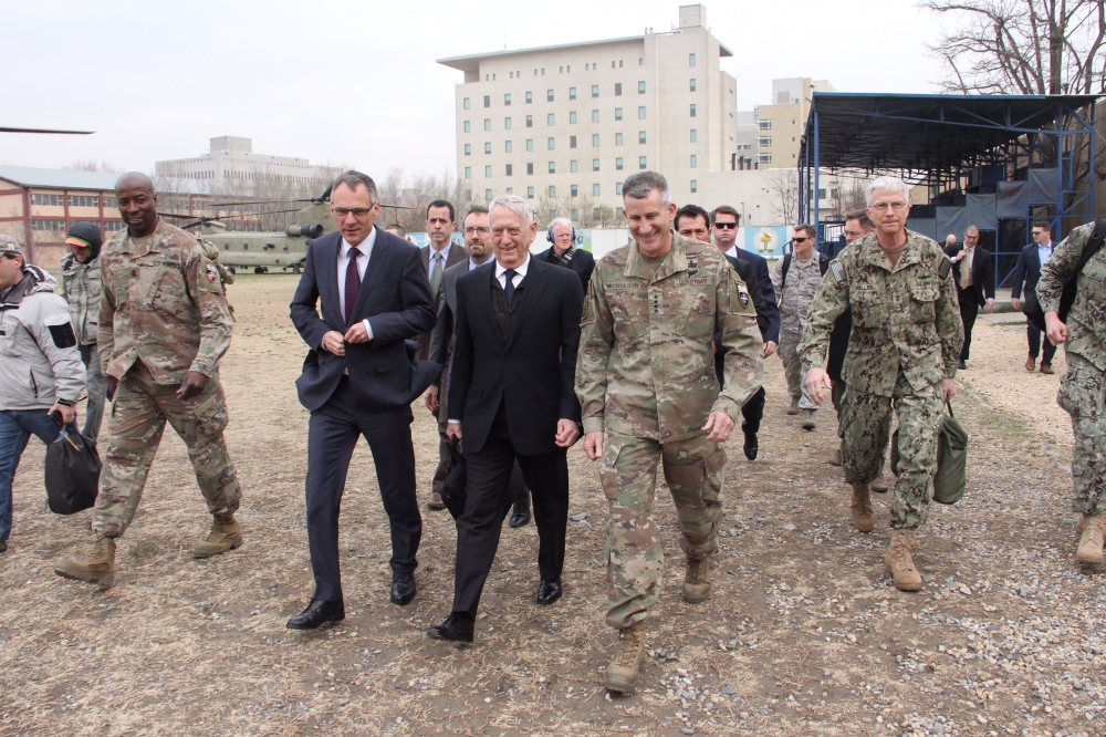 US Defense Secretary Jim Mattis (C) walks with US General John Nicholson (centre R) at the Resolute Support Mission headquarters on an unannounced visit to Kabul on March 13, 2018.AFP / Thomas Watkins 