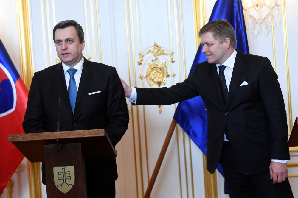 Speaker of the Slovakia's National Council Andrej Danko (L) and Slovakia's Prime Minister Robert Fico react after a meeting at the Bratislava castle, Bratislava, Slovakia March 9, 2018. REUTERS/Radovan Stoklasa