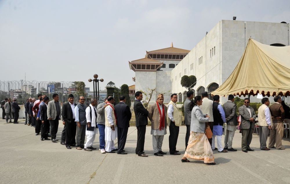 Nepali parliamentarians wait to cast their votes to elect Nepal's President in Kathmandu on March 13, 2018.  AFP 

