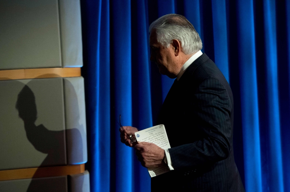 Rex Tillerson, outgoing US Secretary of State leaves after making a statement after his dismissal at the State Department in Washington, DC, March 13, 2018. Secretary of State Rex Tillerson is the latest top official to leave a US administration where tur
