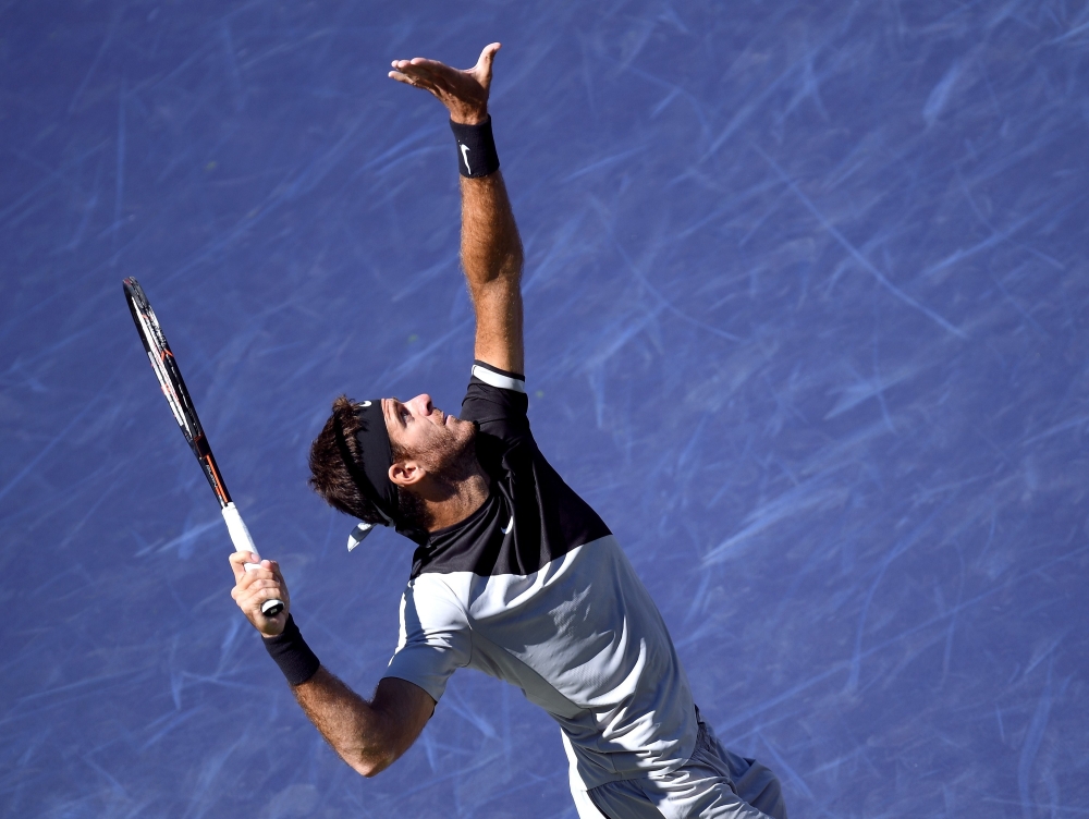 Juan Martin Del Potro of Argentina serves in his semifinal victory over Milos Raonic of Canada during the BNP Paribas Open at the Indian Wells Tennis Garden on March 17, 2018, in Indian Wells, California. Harry How/Getty Images/AFP