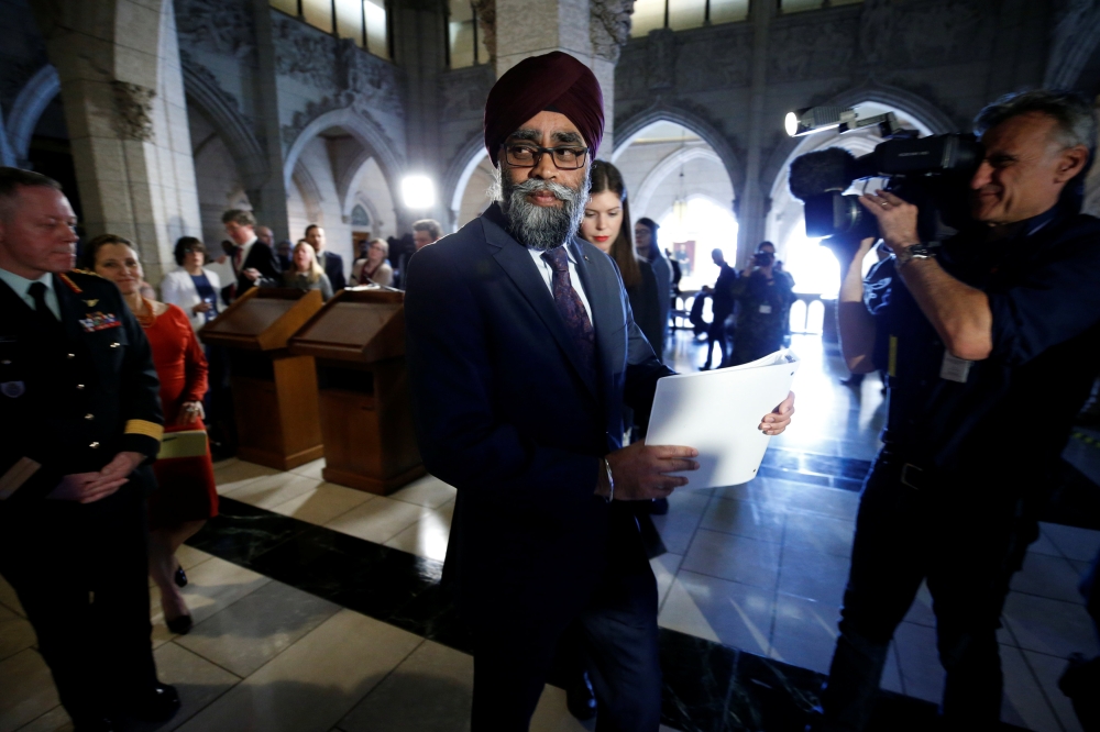 Canada's Defence Minister Harjit Sajjan leaves following a news conference announcing Canada will send helicopters and support troops to join a United Nations peacekeeping mission in Mali, on Parliament Hill in Ottawa, Ontario, Canada, March 19, 2018. Reu