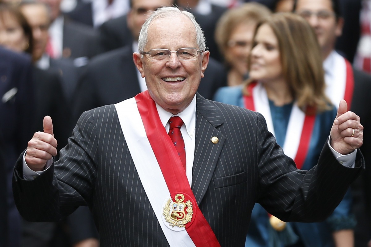 Peru's president Pedro Pablo Kuczynski walks to the Government Palace after swearing-in at the Congress in Lima on July 28, 2016. (AFP) 
