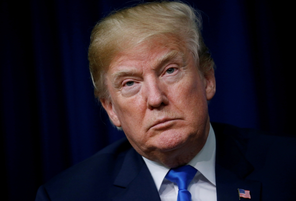 U.S. President Donald Trump takes part in a forum called Generation Next at the Eisenhower Executive Office Building in Washington, U.S., March 22, 2018. REUTERS/Leah Millis/File Photo
