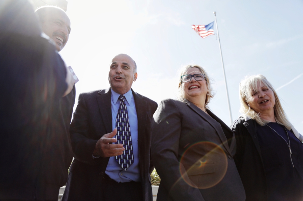Family members and spokespeople of defendant Noor Salman, the widow of the Pulse Nightclub gunman, speak with members of the media outside a federal courthouse following her acquittal in Orlando, Florida, March 30, 2018. Reuters/Joey Roulette