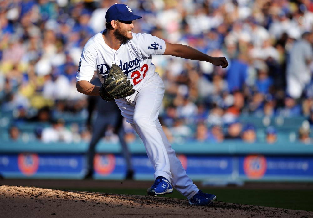 Los Angeles Dodgers starting pitcher Clayton Kershaw (22) throws against the San Francisco Giants in the fifth inning of the opening day game at Dodger Stadium. Gary A. Vasquez
