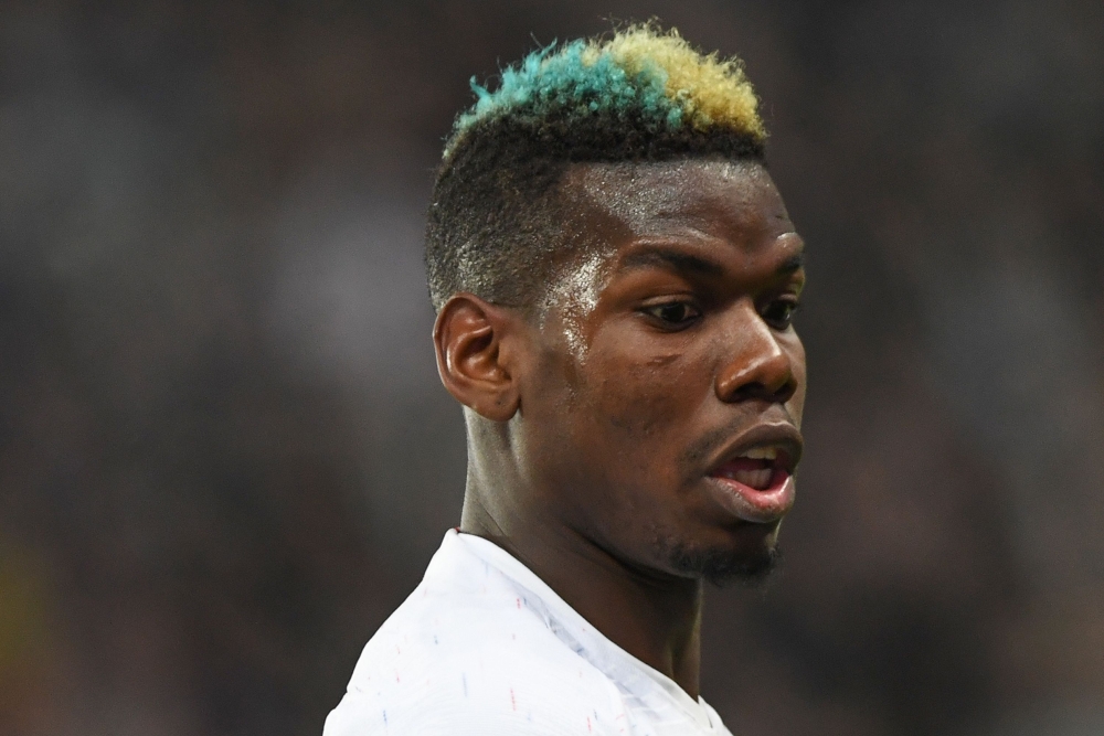 France's midfielder Paul Pogba during an international friendly football match between Russia and France at the Saint Petersburg Stadium in Saint Petersburg on March 27, 2018. / AFP / Kirill KUDRYAVTSEV