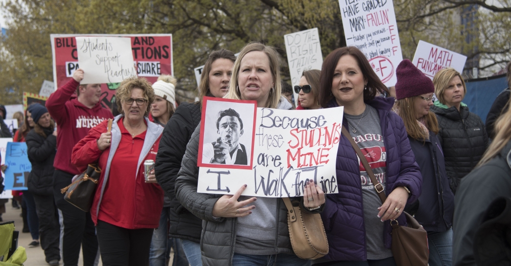 Teachers walk the picket line during a rally at the state capitol on April 2, 2018 in Oklahoma City.  Mary Fallin. J Pat Carter/Getty Images/AFP