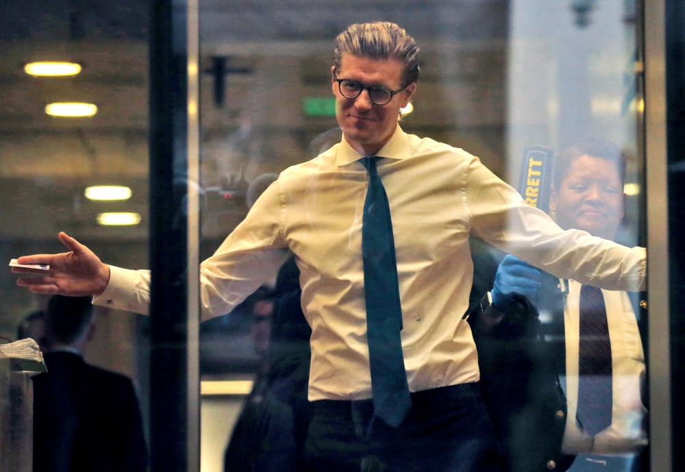 Alex van der Zwaan goes through security at the U.S. District Court after arriving for his sentencing in Washington, D.C., April 3, 2018. Reuters/Leah Millis