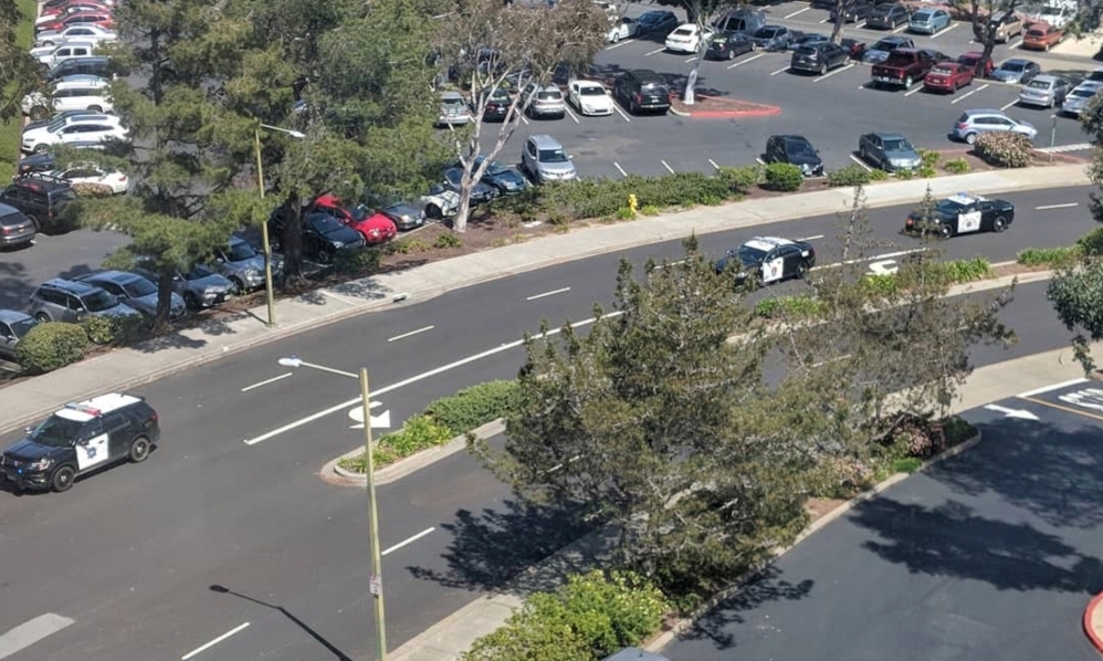 Officials are seen following a possible shooting at the headquarters of YouTube, in San Bruno, California, U.S., April 3, 2018 in this picture obtained from social media. 