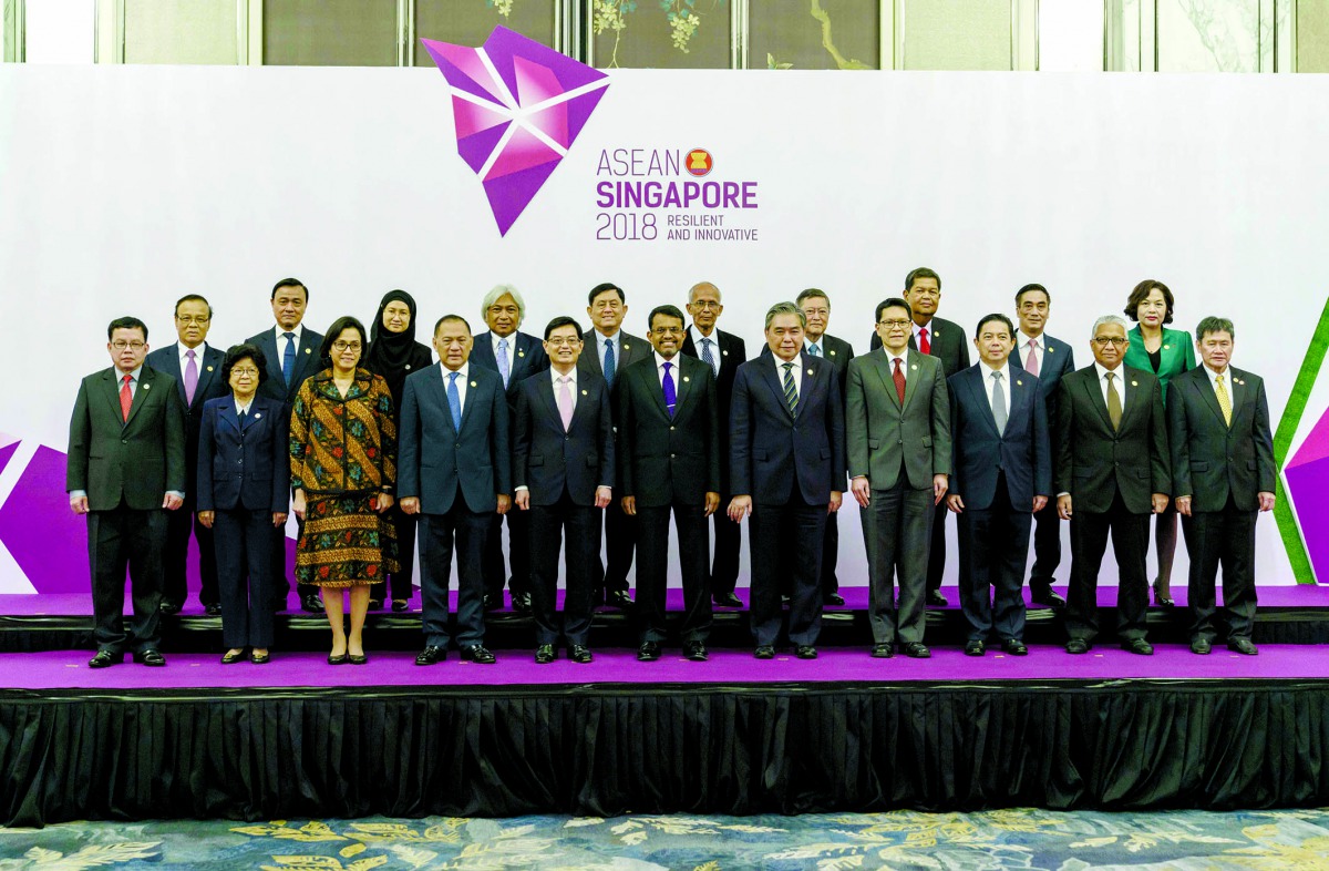 Asian Foreign ministers and central bank governors pose for a group photograph at the ASEAN Finance Ministers' and Central Bank Governors' meeting in Singapore on April 6, 2018. AFP / Nicholas Yeo