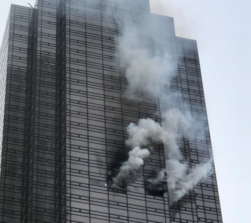 Smoke rises from the 50th floor of Trump Tower in New York, United States on April 7, 2018. Muhammed Said Tan?l - Anadolu Agency