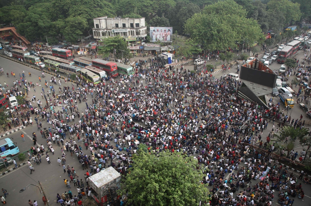 Bangladeshi university students block a road during a protest against the quota system used in government recruitment in Dhaka on April 9, 2018. AFP
 