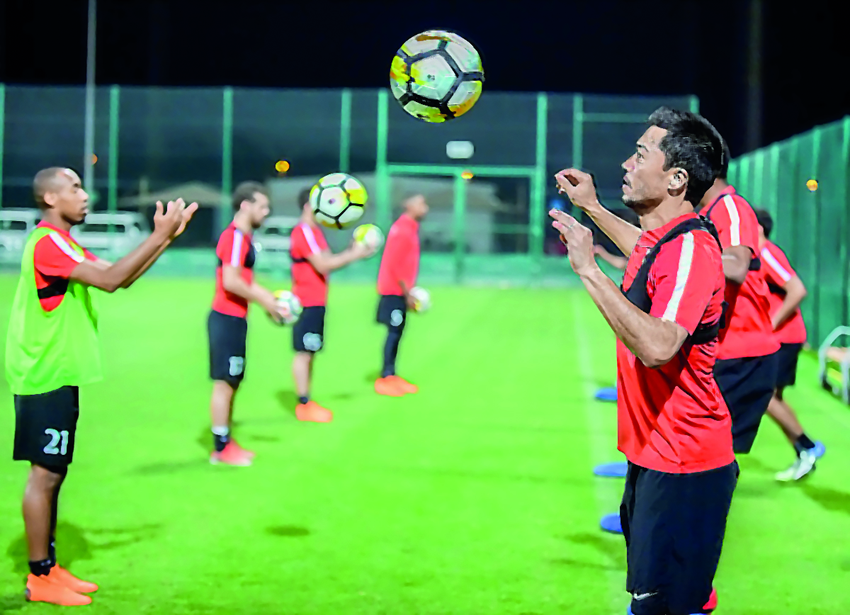 Al Rayyan skipper Rodrigo tabata (right) takes part in a training session with team-mates ahead of their AFC Champions League match against Al Ain.