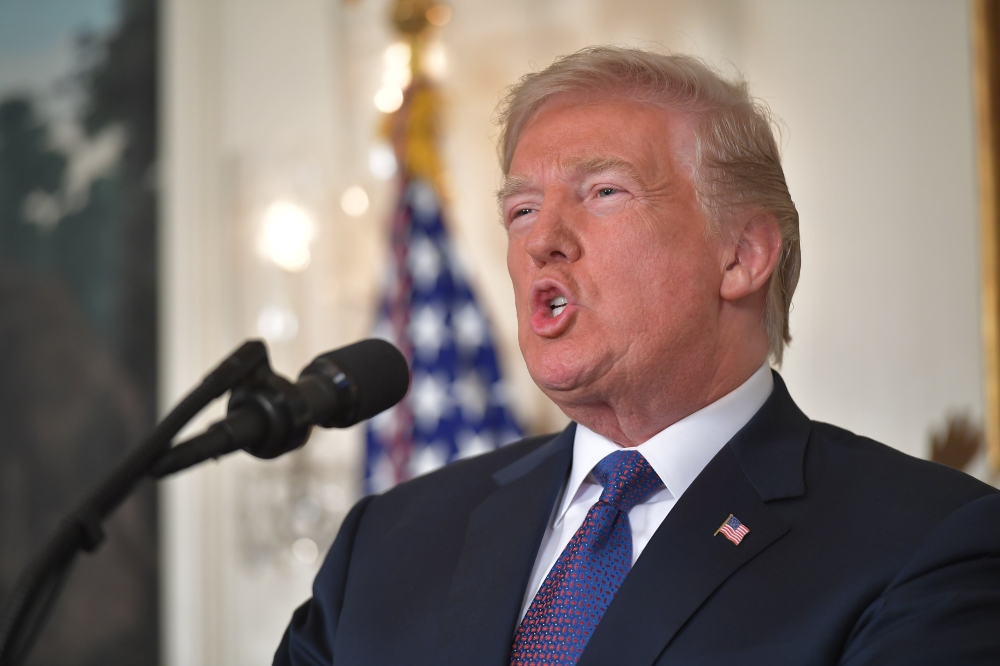 US President Donald Trump addresses the nation on the situation in Syria April 13, 2018 at the White House in Washington, DC.  AFP / Mandel NGAN
