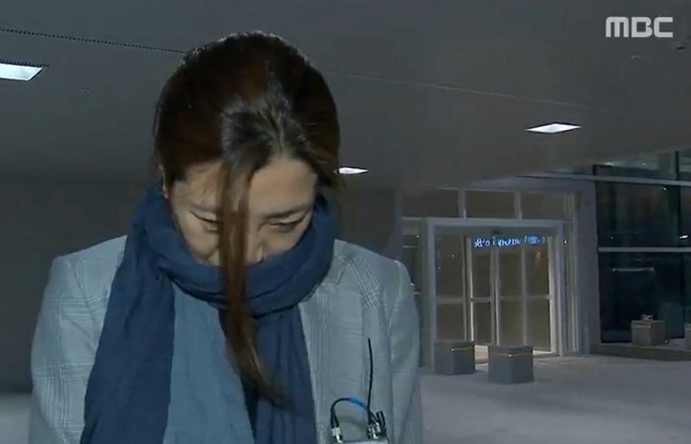 Cho Hyun-min, a senior vice president at Korean Air Lines and a daughter of its chairman Cho Yang-ho, arrives at Incheon International Airport in Incheon, South Korea, in this still image from MBC exclusive news report footage obtained by Yonhap on April 