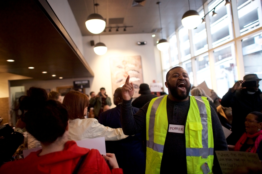 Interfaith clergy leaders stage a sit-in in a Center City Starbucks, near the location where two black men were arrested, in Philadelphia, Pennsylvania U.S. April 16, 2018. REUTERS/Mark Makela
