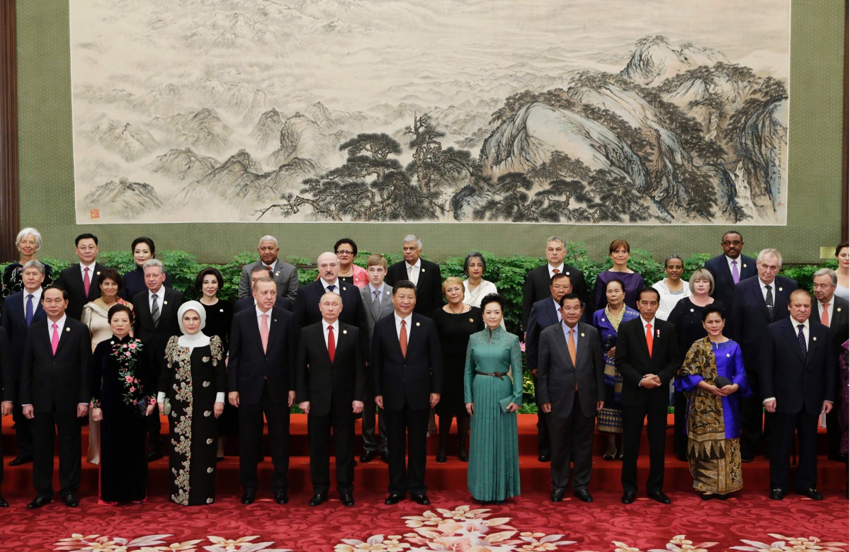 Chinese President Xi Jinping poses for a group photo with other delegates and guests at the welcoming banquet for the Belt and Road Forum in Beijing on May 14, 2017. (AFP / Jason Lee)