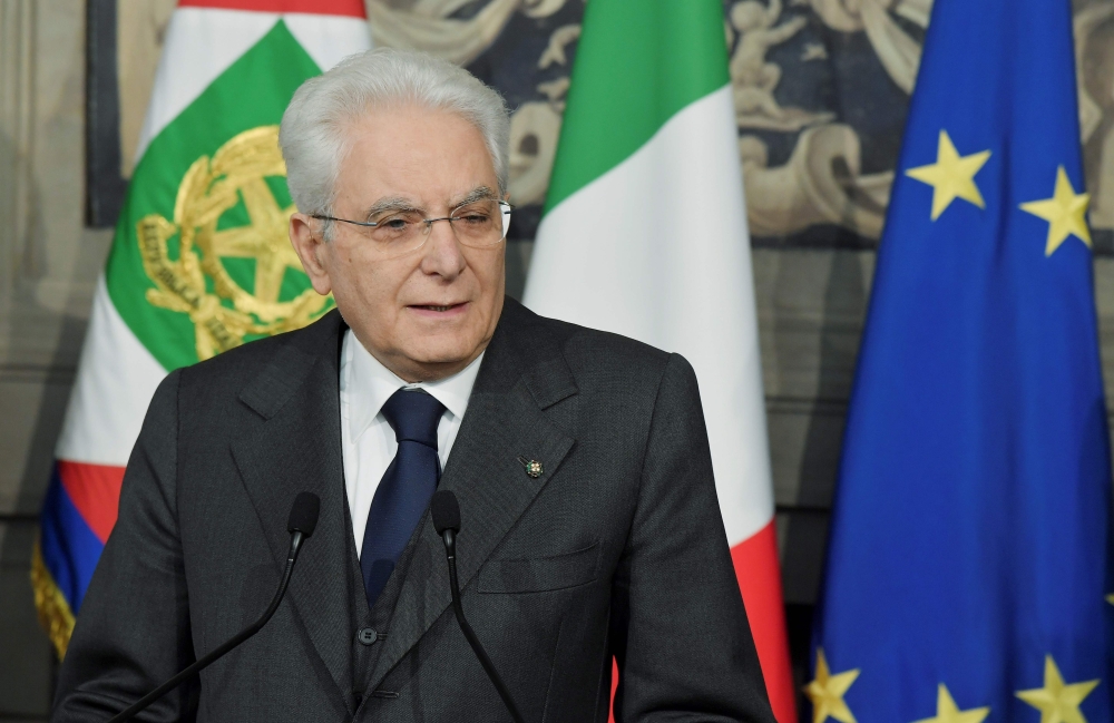Italian President Sergio Mattarella talks with journalists at the end of the second day of consultations with political parties at Quirinal palace in Rome on April 13, 2018. AFP / Tiziana Fabi