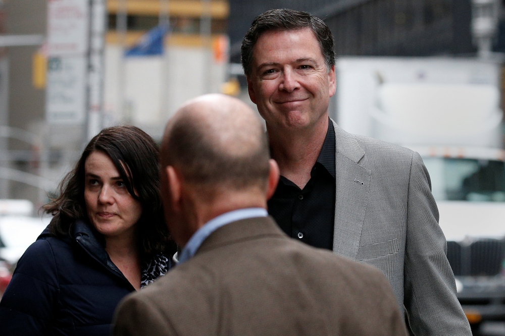 Former FBI Director James Comey arrives for a taping of 