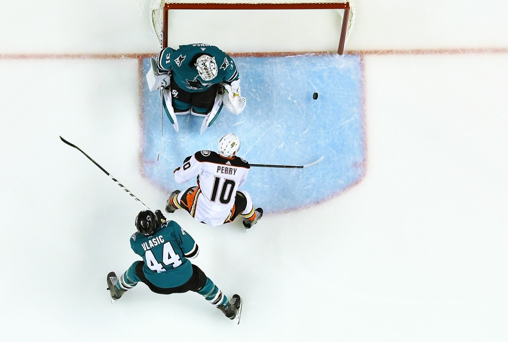 Corey Perry #10 of the Anaheim Ducks scores a goal between goalie Martin Jones #31 and Marc-Edouard Vlasic #44 of the San Jose Sharks, only to have it called off due to an offsides call during the third period in Game Four of the Western Conference First 