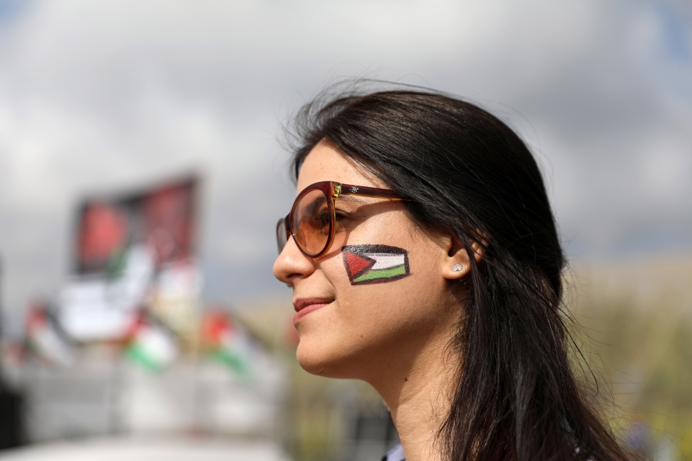 A demonstrator takes part in a rally of Israeli Arabs calling for the right of return for refugees who fled their homes during the 1948 Arab-Israeli War, near Atlit, Israel April 19, 2018. Reuters/Ammar Awad