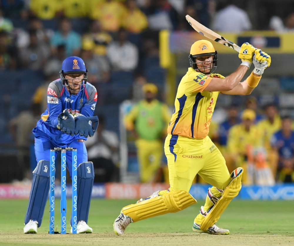 Chennai Super Kings cricketer Shane Watson (R) plays a shot during the 2018 Indian Premier League (IPL) Twenty20 cricket match between Rajasthan Royals and Chennai Super Kings at The Maharashtra Cricket Association Stadium in Pune on April 20, 2018. GETTY