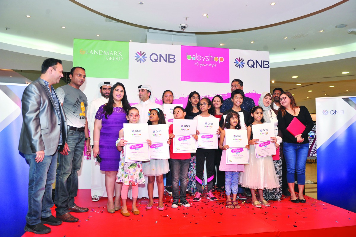 Officials, judges and winners during the QNB-Babyshop drawing competition ‘Expressions’ held at Alasmakh Mall yesterday. Pic: Baher Amin / the peninsula