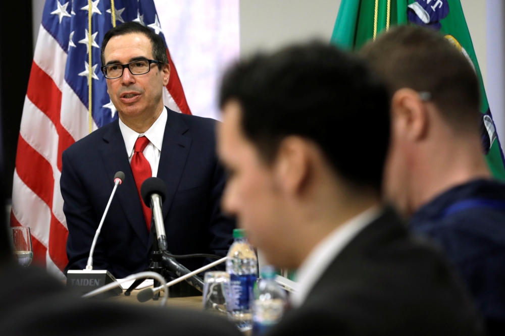 US Treasury Secretary Steve Mnuchin speaks at a news conference during the IMF/World Bank spring meeting in Washington, U.S., April 21, 2018. REUTERS/Yuri Gripas