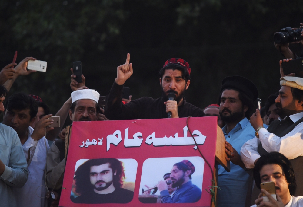 Leader of Pakistan's Pashtun Protection Movement (PTM) Manzoor Pastheen speaks during a demonstration in Lahore on April 22, 2018.  AFP / Arif Ali