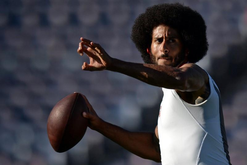 San Francisco 49ers quarterback Colin Kaepernick throws a pass before the game against the San Diego Chargers at Qualcomm Stadium Mandatory Credit: Jake Roth-USA TODAY Sports/Reuters