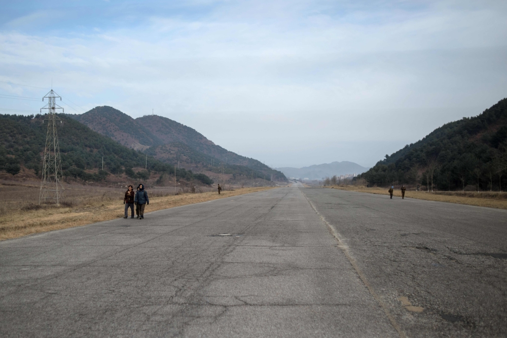 File photo of a section of the Pyongyang to Kaesong highway, November 30, 2016.  / AFP / Ed JONES
