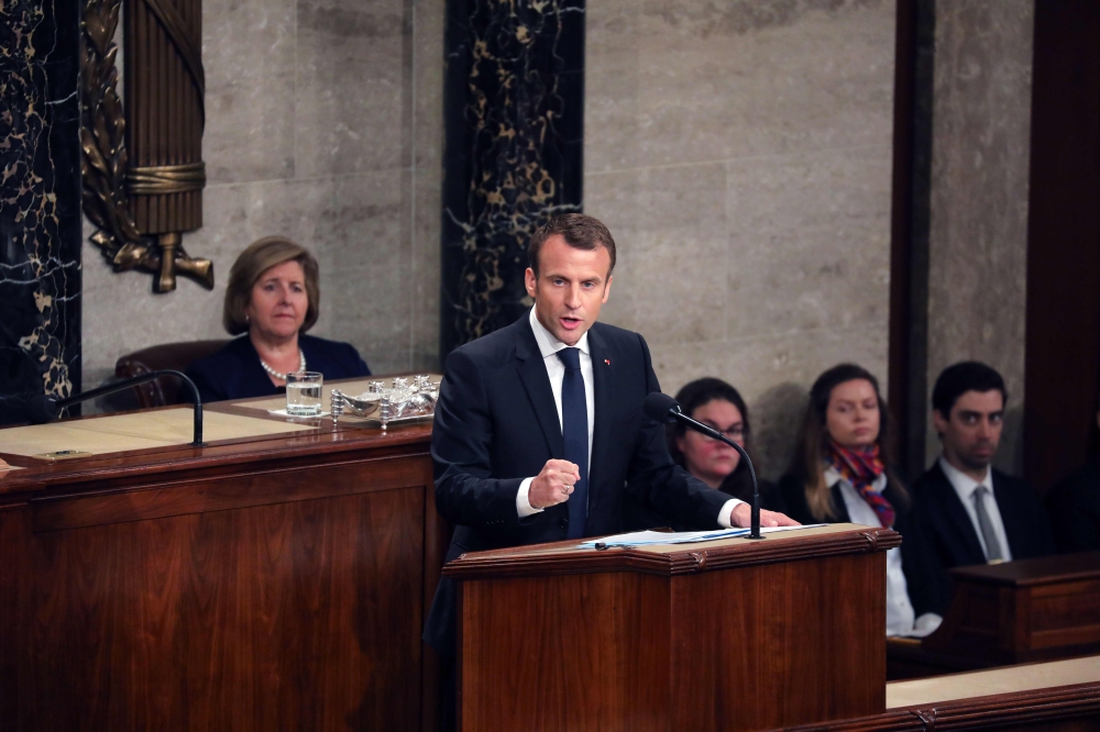 France's President Emmanuel Macron addresses a joint meeting of Congress inside the House chamber on April 25, 2018 at the US Capitol in Washington, DC. AFP / ludovic Marin