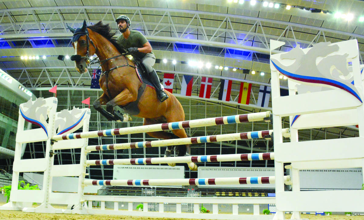 Riders takes part in practice runs ahead of the 12th and final round of the Hathab Equestrian Tour at the Al Shaqab Indoor Arena in Doha. A fierce competition is expected as country’s best riders will be looking to secure the top spots in the standings in