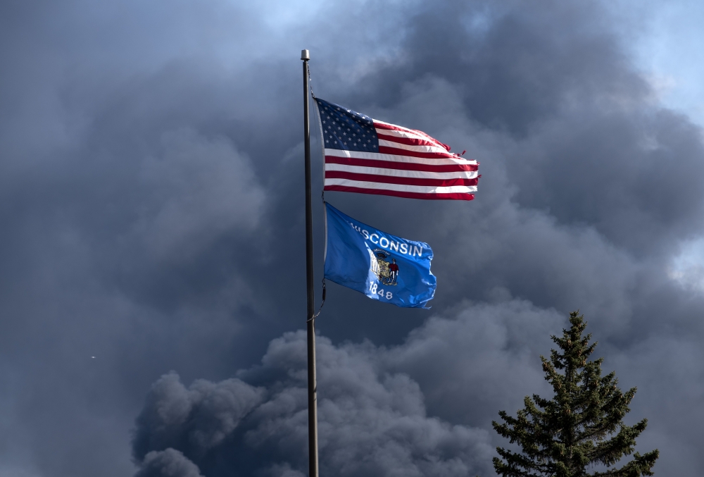 Smoke rises from a fire at the Husky Oil Refinery on April 26, 2018 in Superior, Wisconsin.  Stephen Maturen/Getty Images/AFP