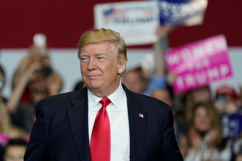 US President Donald Trump arrives to speak at a Make America Great Again Rally in Washington, Michigan April 28, 2018. Reuters/Joshua Roberts